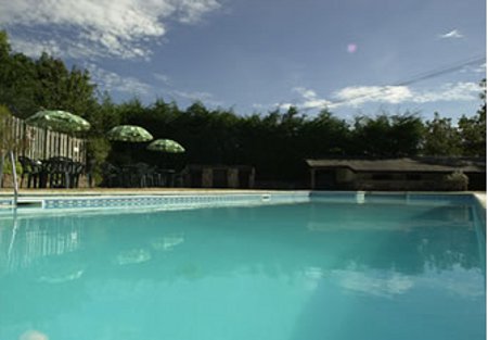 The swimming pool at Collacott Farm Cottages, Kings Nympton