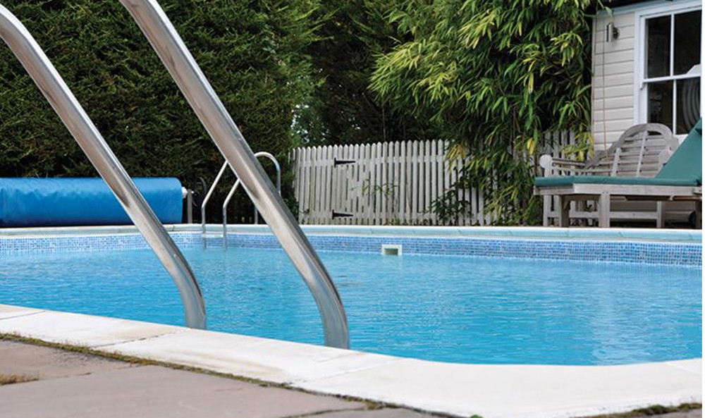 The outdoor swimming pool at Oak Cliff Place
