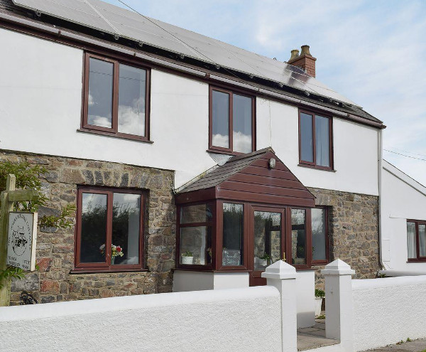 Sheepwalks Cottage in St Florence, just down the road from Tenby, sleeps 8 people