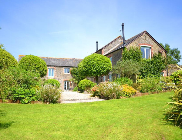 Wild Goose Barn & The Creamery is a large holiday cottage in Kingston, Devon. Wild Goose Barn & The Creamery sleeps 12 people